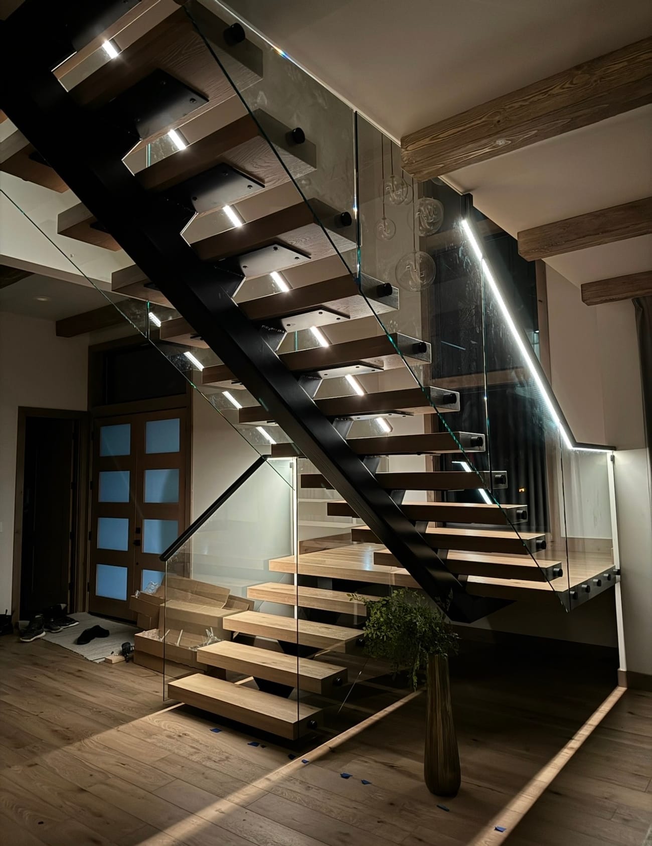 Floating staircase with glass railing